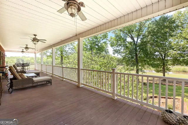 a bedroom with a bed a desk and chair