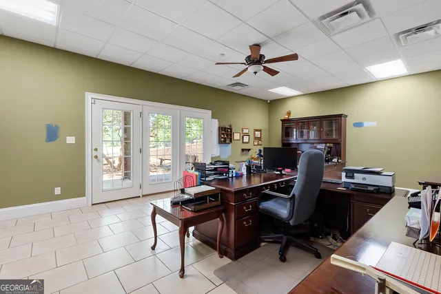 a view of a workspace with furniture