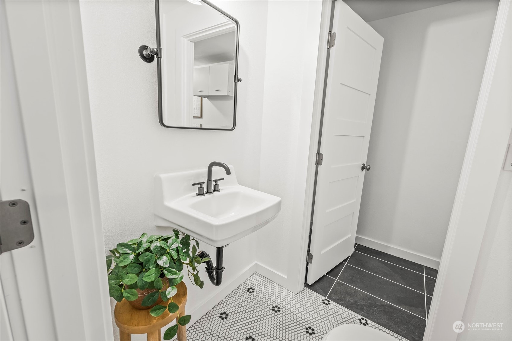 4008 66th Street Gig Harbor, WA 98335 - Photo 21 of 39 a bathroom with a sink and mirror