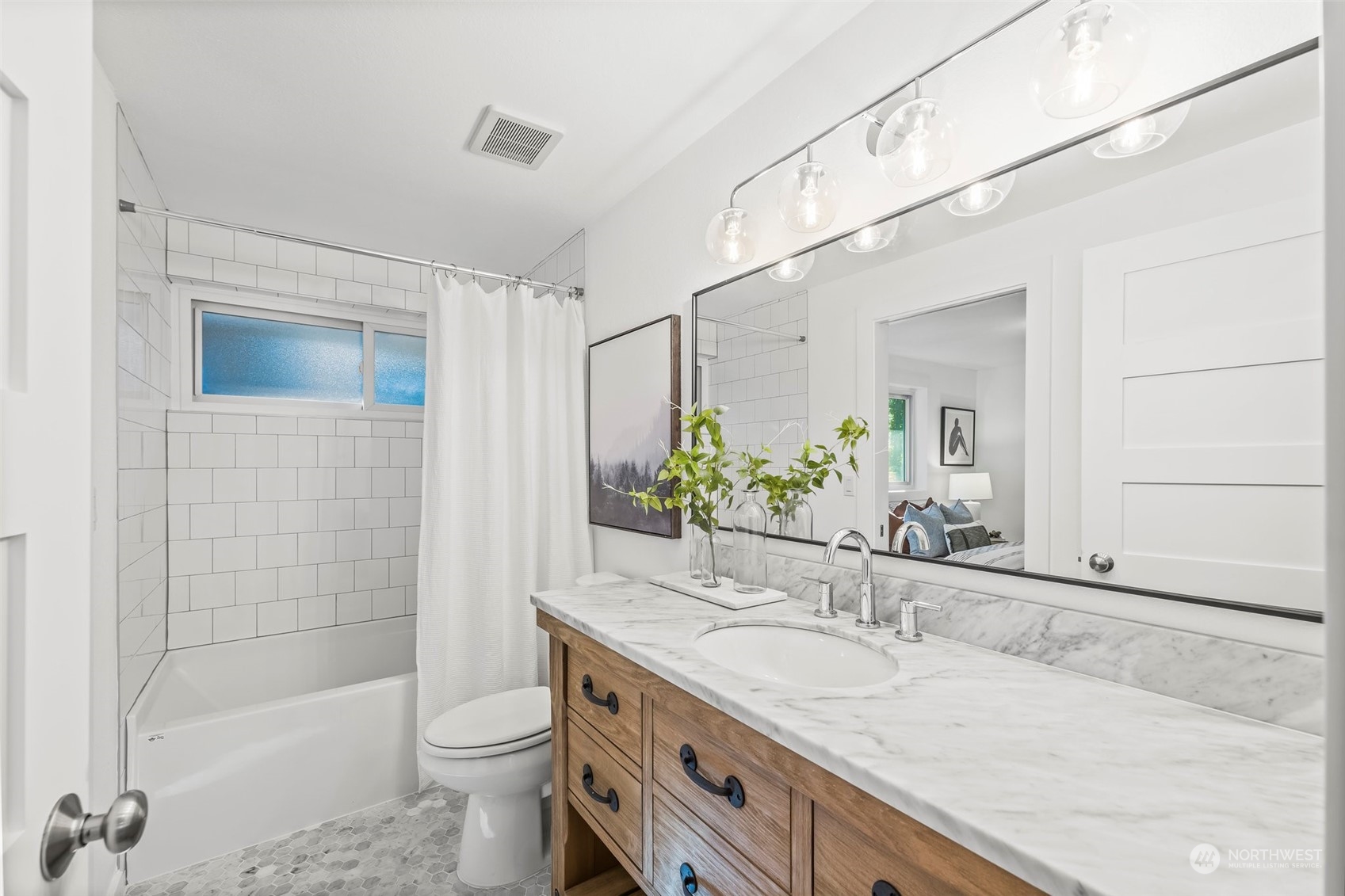 4008 66th Street Gig Harbor, WA 98335 - Photo 26 of 39 a bathroom with a granite countertop sink a toilet and shower