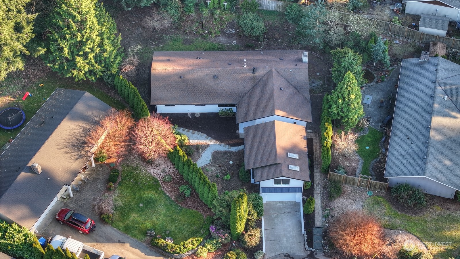 4008 66th Street Gig Harbor, WA 98335 - Photo 34 of 39 an aerial view of a house with a yard lake view and mountain view