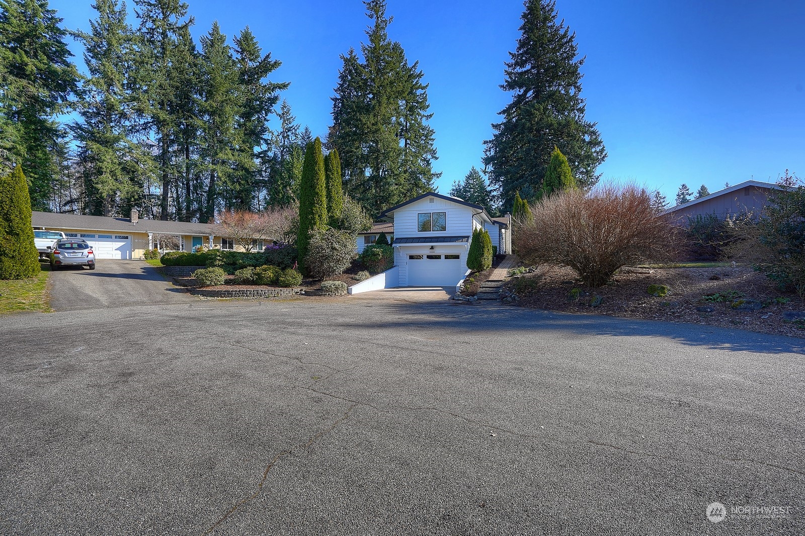 4008 66th Street Gig Harbor, WA 98335 - Photo 39 of 39 a view of a street with a cars park side of a road