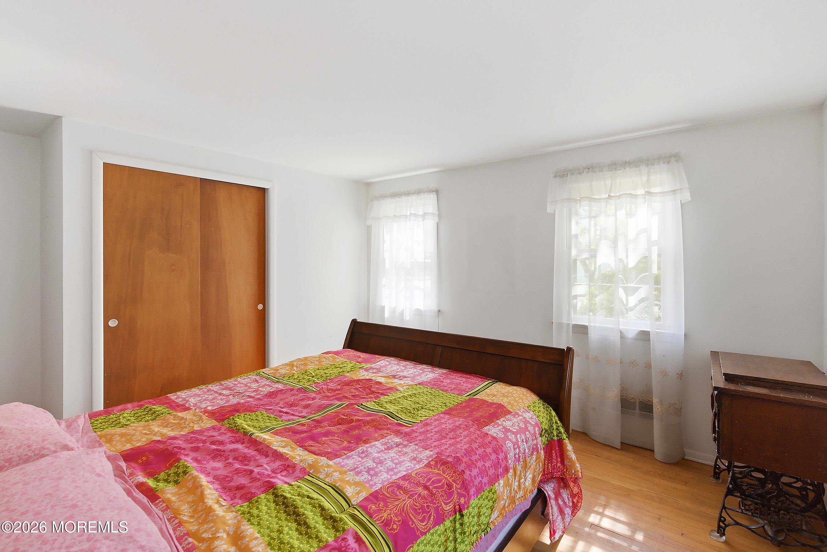 464 Newport Road Forked River, NJ 08731 - Photo 12 of 23 a bedroom with a bed and a window