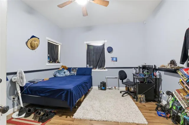 a view of a house with a yard porch and sitting area