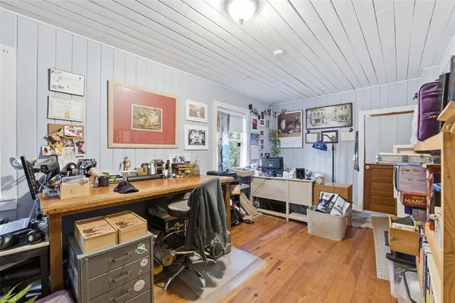 a living room with furniture fireplace and flat screen tv