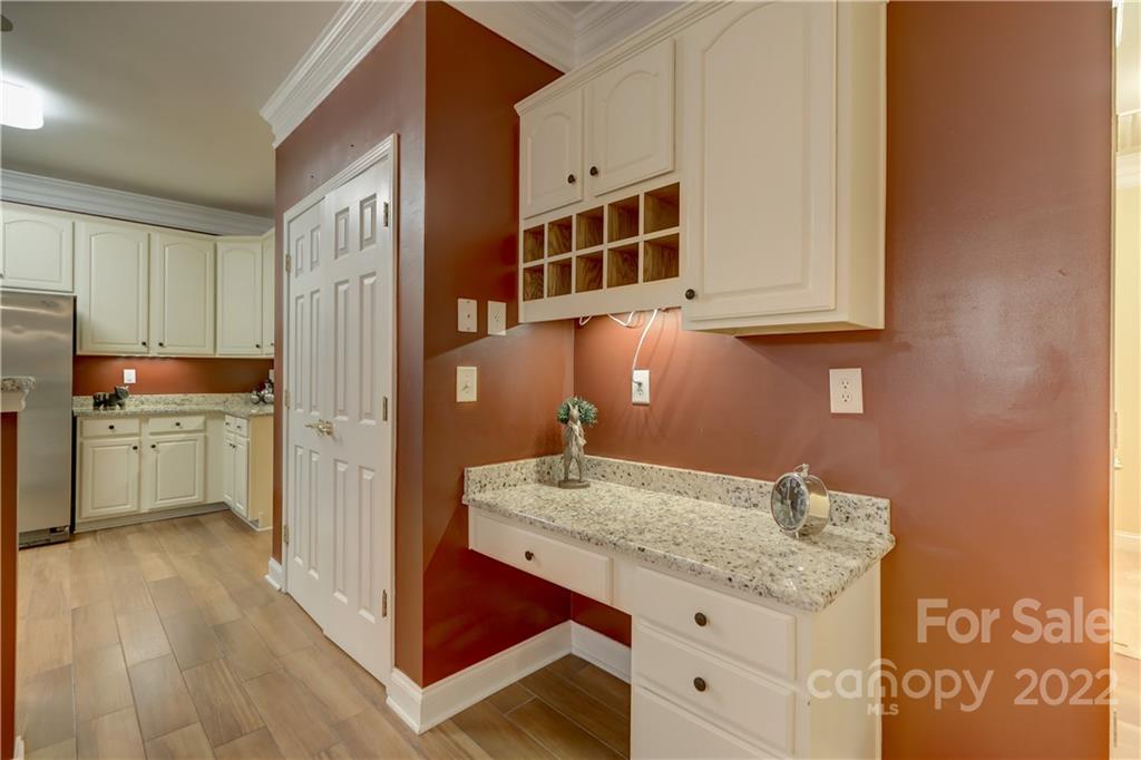 3229 Sapphire Lane Fort Mill, SC 29708 - Photo 11 of 40 a kitchen with stainless steel appliances granite countertop a sink and cabinets