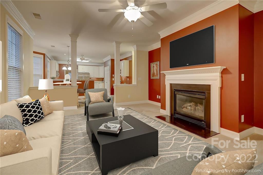 3229 Sapphire Lane Fort Mill, SC 29708 - Photo 12 of 40 a living room with furniture and a fireplace