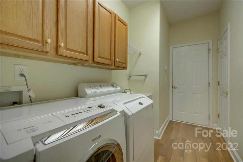3229 Sapphire Lane Fort Mill, SC 29708 - Photo 21 of 40 a utility room with dryer and washer