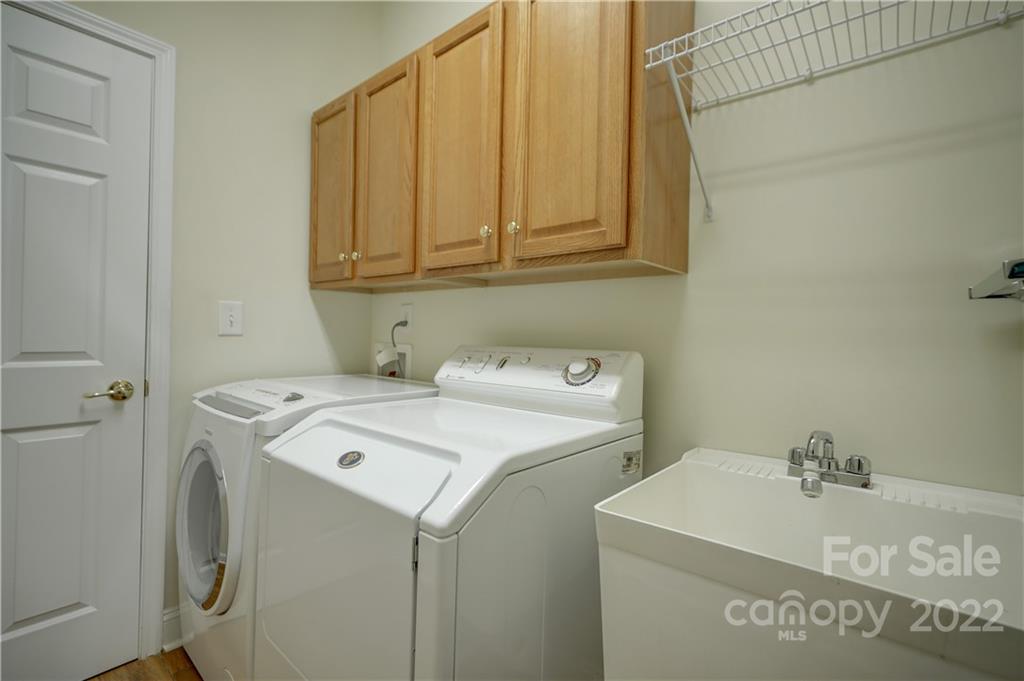 3229 Sapphire Lane Fort Mill, SC 29708 - Photo 22 of 40 a utility room with dryer and washer