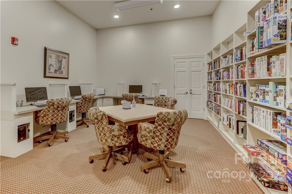 3229 Sapphire Lane Fort Mill, SC 29708 - Photo 28 of 40 a view of a livingroom with furniture and bookshelf