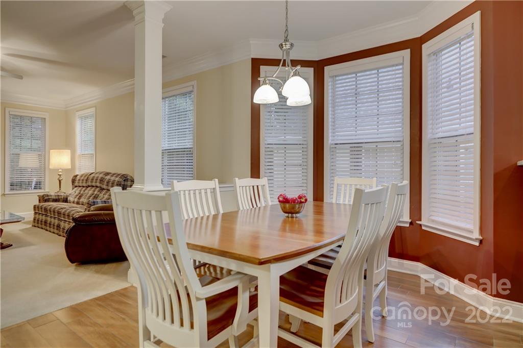 3229 Sapphire Lane Fort Mill, SC 29708 - Photo 10 of 40 a view of a dining room with furniture and window