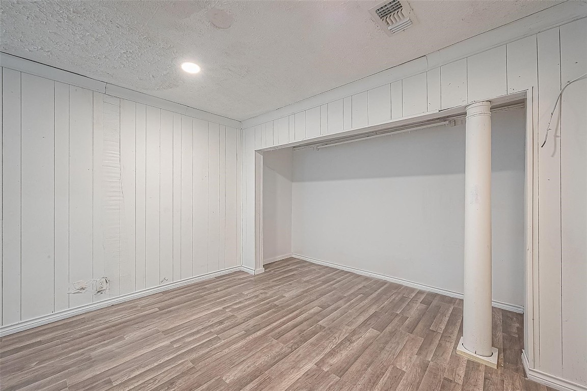6718 Madrid Street Houston, TX 77021 - Photo 20 of 26 wooden floor in an empty room