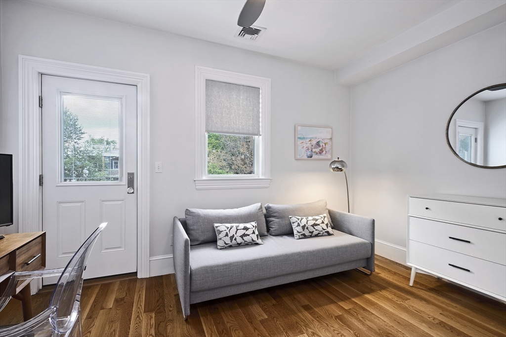 870 East 4th Street, Unit 2 Boston, MA 02127 - Photo 12 of 20 a living room with furniture and a window