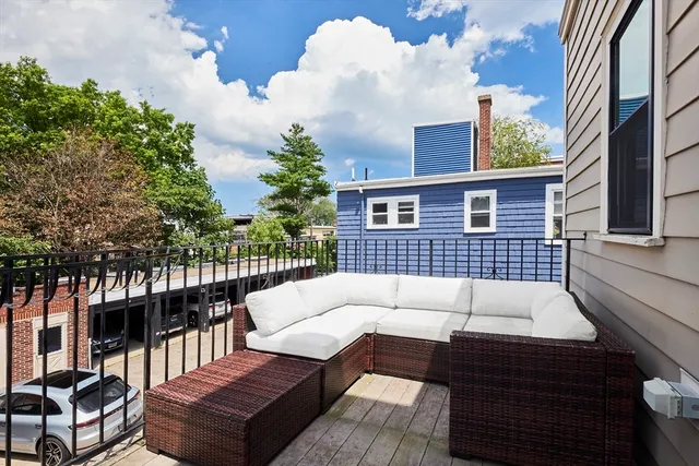 a view of a roof deck with couches
