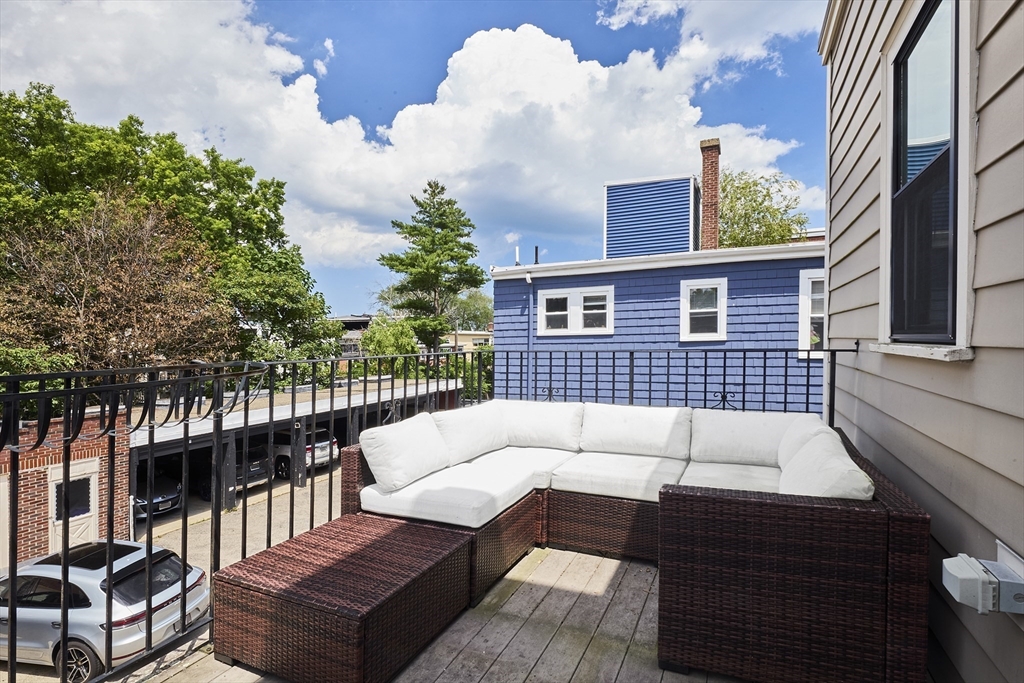 870 East 4th Street, Unit 2 Boston, MA 02127 - Photo 15 of 20 a view of a roof deck with couches