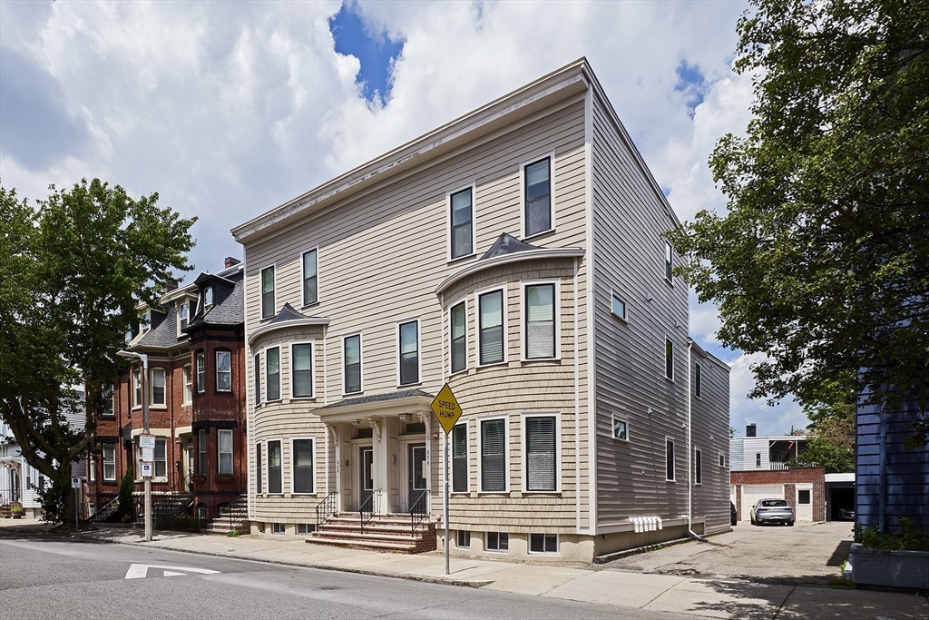 870 East 4th Street, Unit 2 Boston, MA 02127 - Photo 19 of 20 a front view of a house with a street