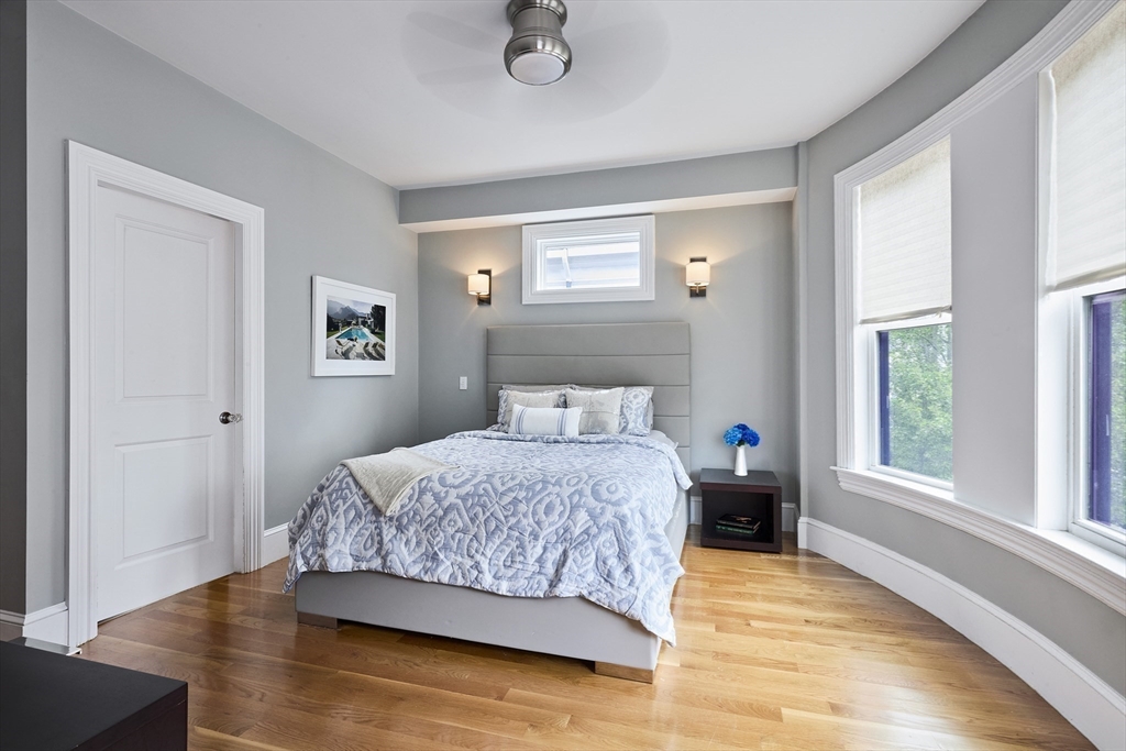 870 East 4th Street, Unit 2 Boston, MA 02127 - Photo 6 of 20 a bedroom with a bed and window