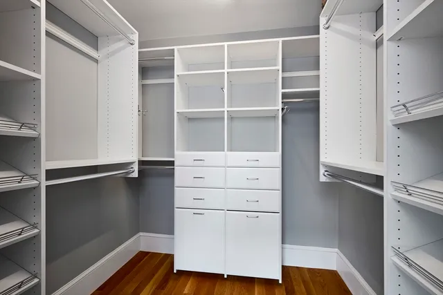 a hallway with cabinets