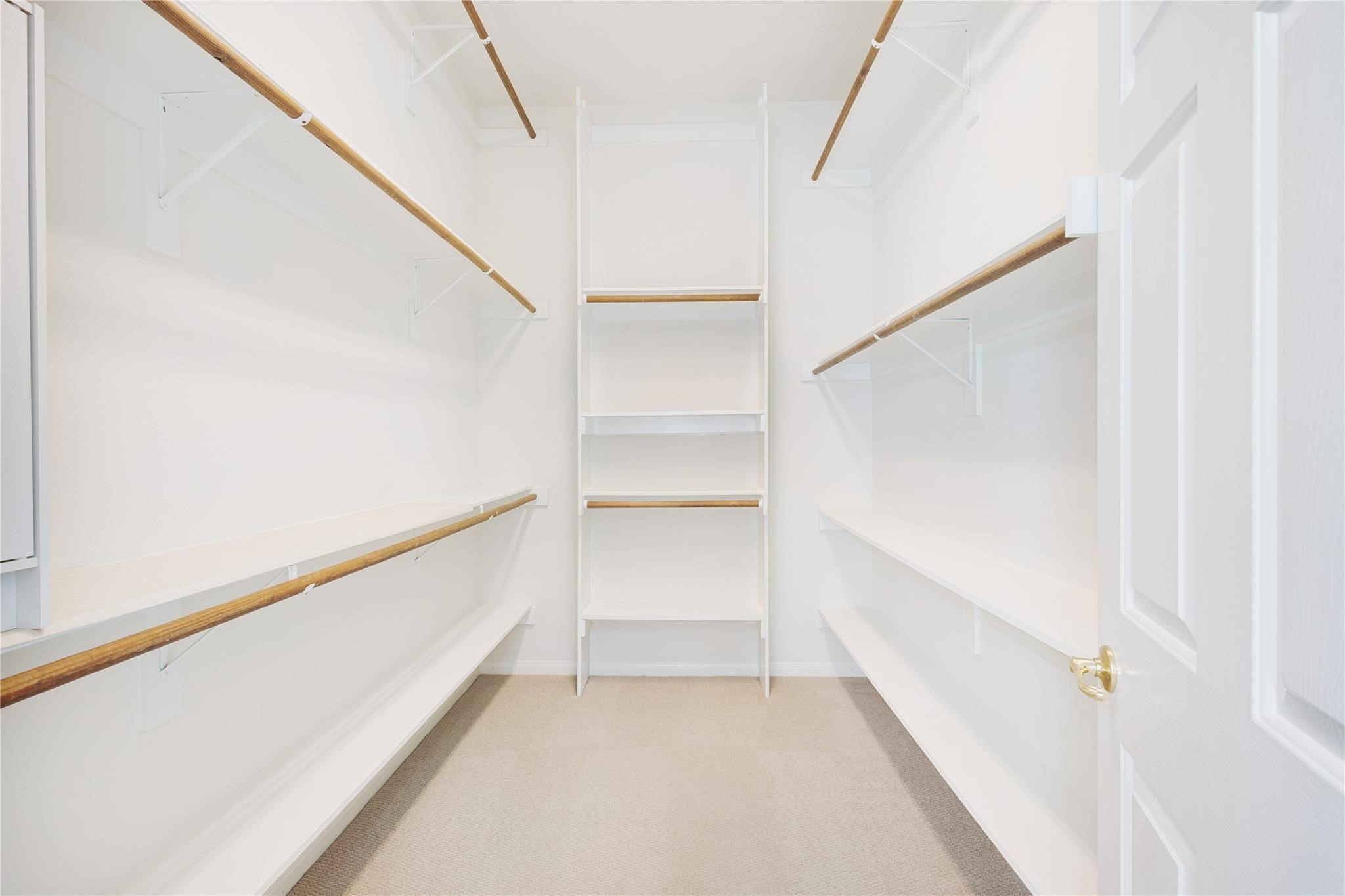 43 Tarrytown Way Conroe, TX 77384 - Photo 26 of 40 a view of an empty walk in closet
