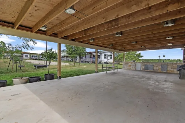 a view of a backyard of a house