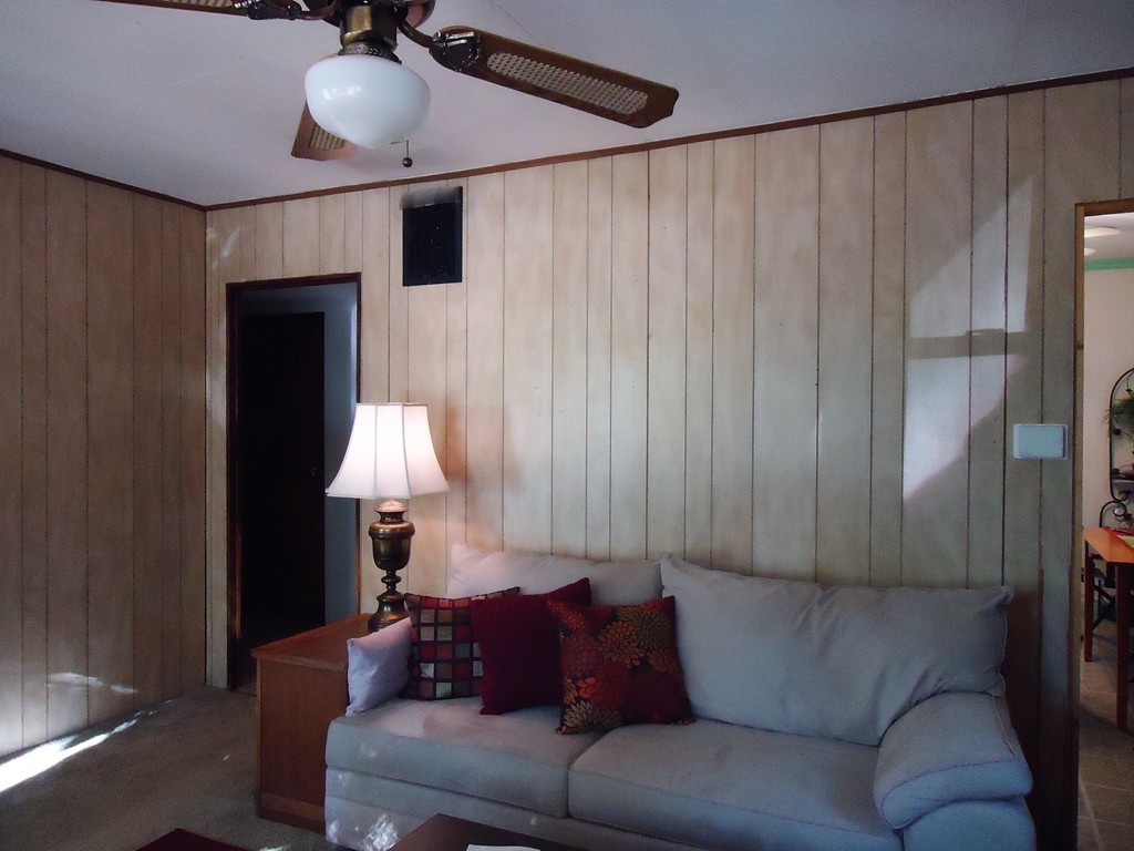68 Victoria Street Springfield, MA 01104 - Photo 11 of 14 a living room with furniture and a lamp