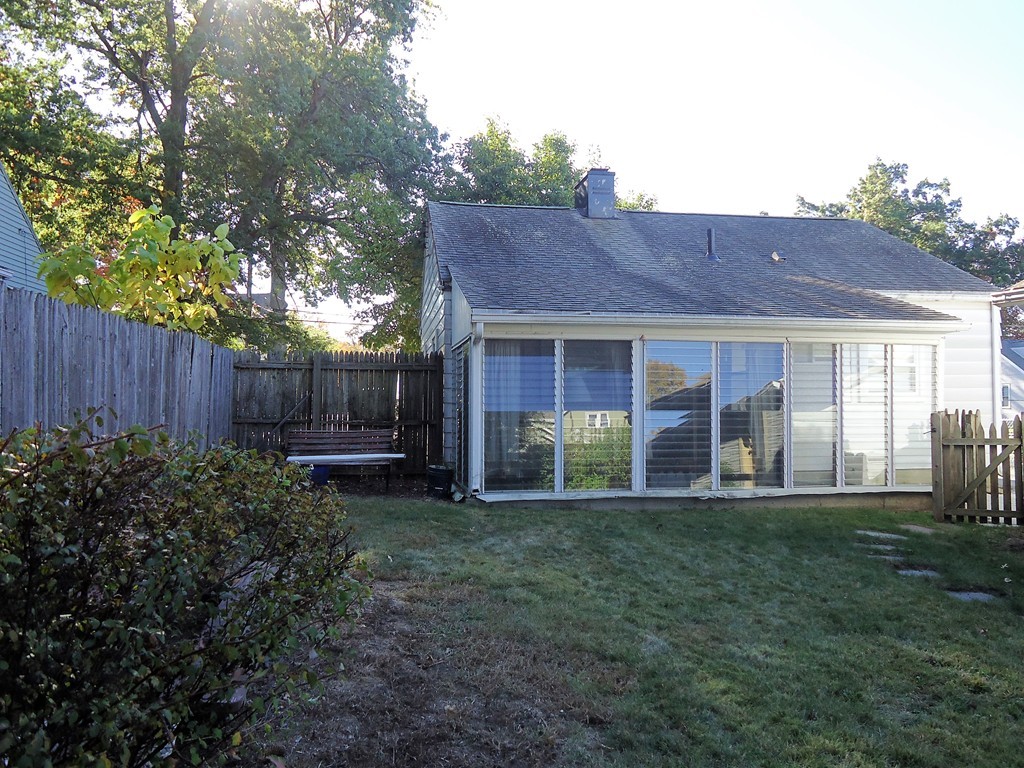 68 Victoria Street Springfield, MA 01104 - Photo 13 of 14 a view of a house with a yard
