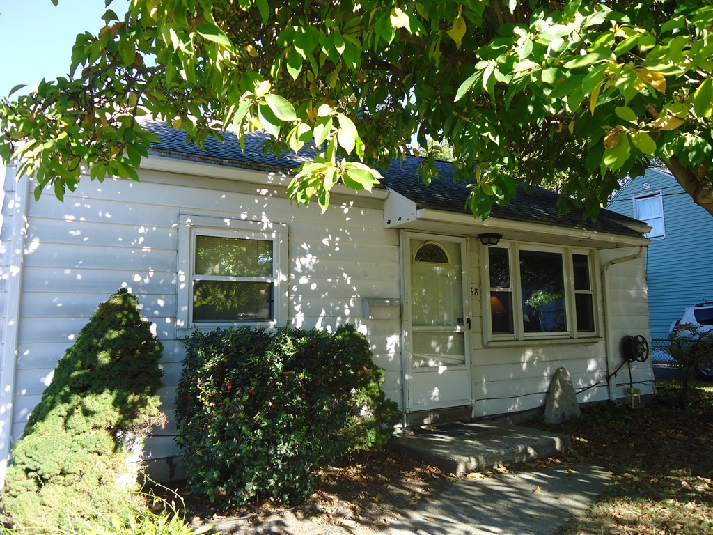 68 Victoria Street Springfield, MA 01104 - Photo 14 of 14 front view of a house with a yard