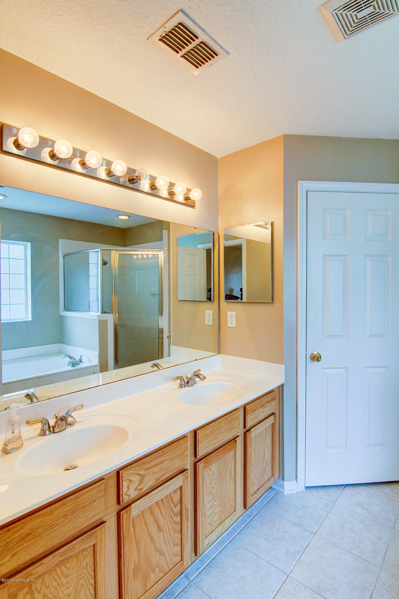6527 Ginnie Springs Road Jacksonville, FL 32258 - Photo 24 of 35 Master Bathroom with his/her sinks