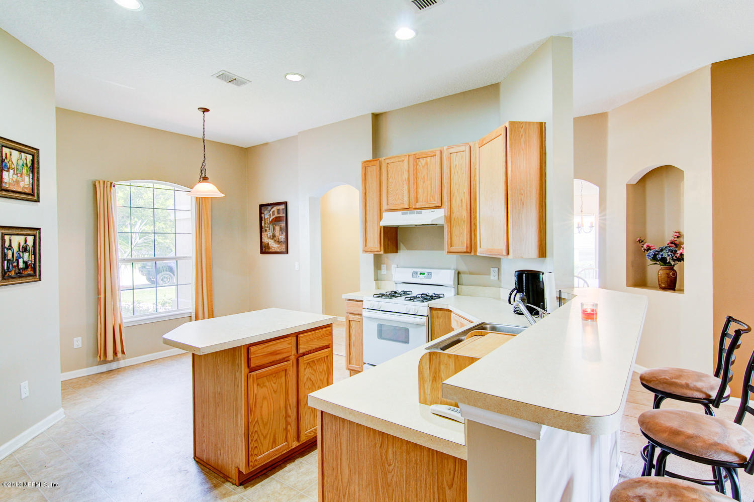 6527 Ginnie Springs Road Jacksonville, FL 32258 - Photo 9 of 35 Breakfast Bar overlooking Family Rm