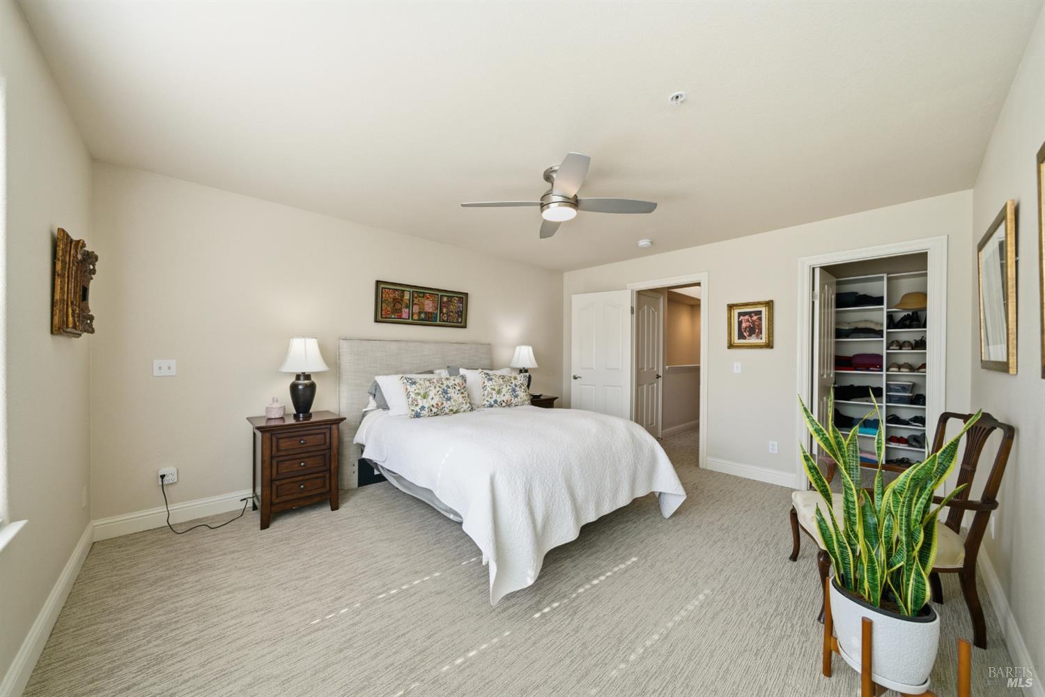 191 Johnson Street Windsor, CA 95492 - Photo 17 of 34 a bedroom with a bed potted plant with the outer view