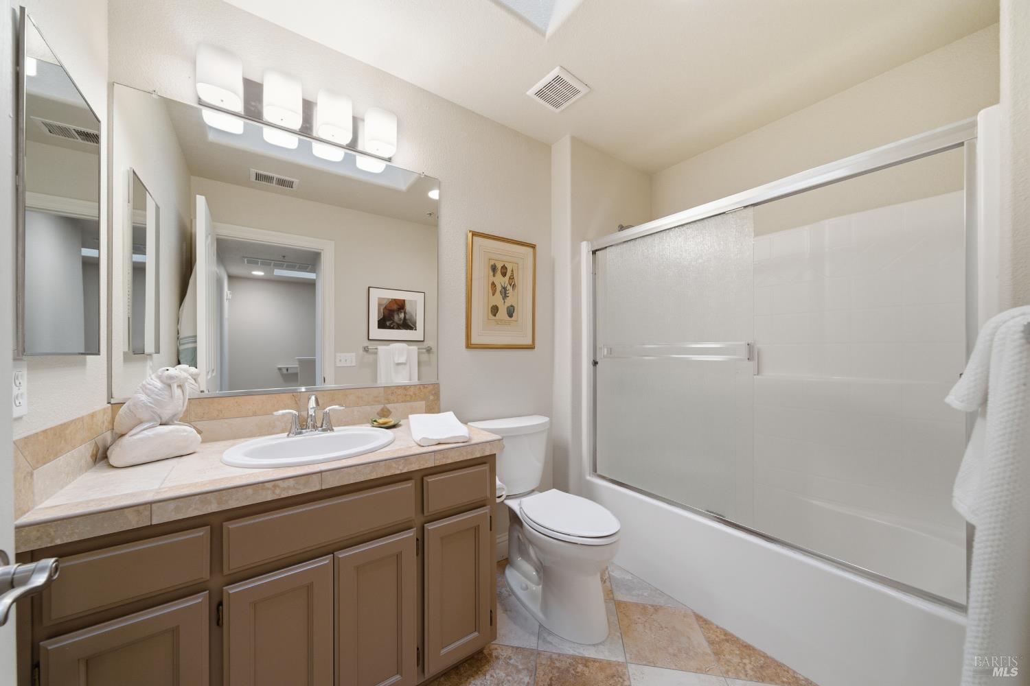 191 Johnson Street Windsor, CA 95492 - Photo 24 of 34 a bathroom with a sink a toilet and shower