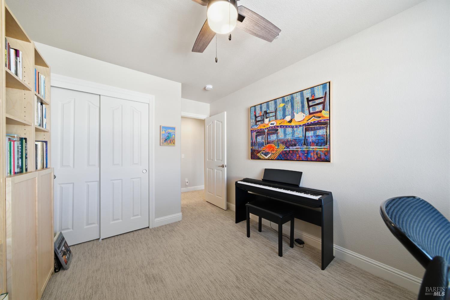 191 Johnson Street Windsor, CA 95492 - Photo 26 of 34 a view of a workspace with furniture and a ceiling fan