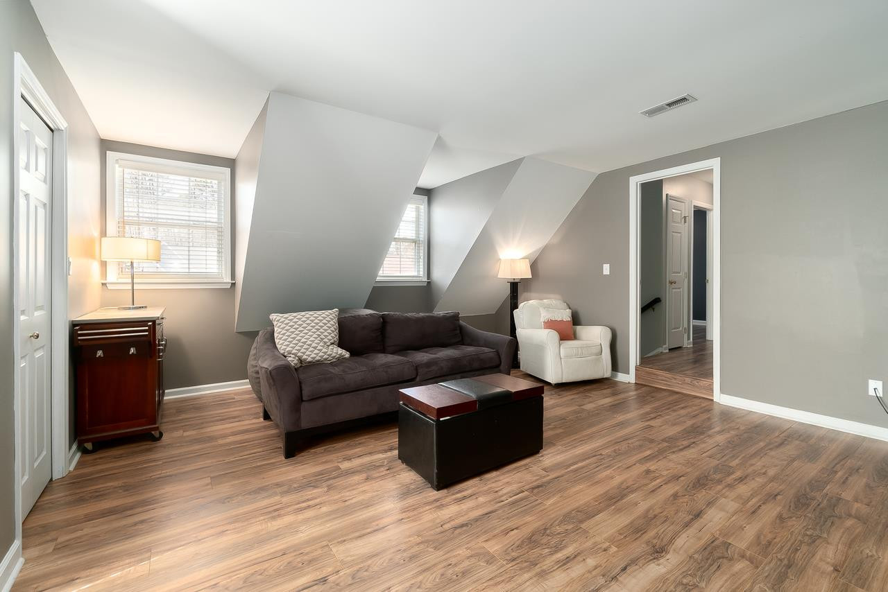 8727 Harps Mill Road Raleigh, NC 27615 - Photo 20 of 25 The pretty laminate flooring continues to the BIG BONUS ROOM with TWO Closets! A great neutral color accents this AWESOME space! Don't forget, this could be a 4th BEDROOM! Bonus Room