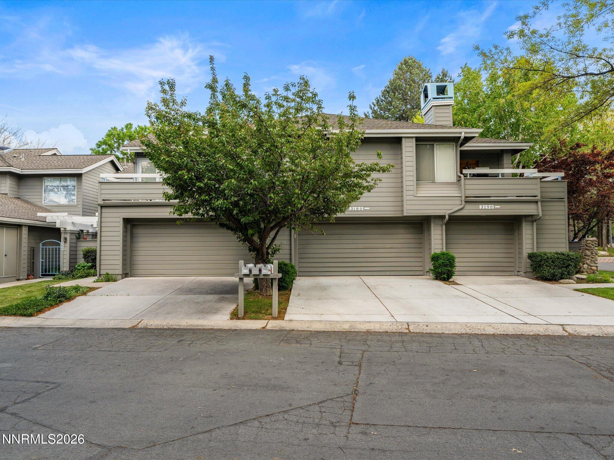 3170 Oakshire Court Reno, NV 89509 - Photo 40 of 43 a view of a house with a yard and garage