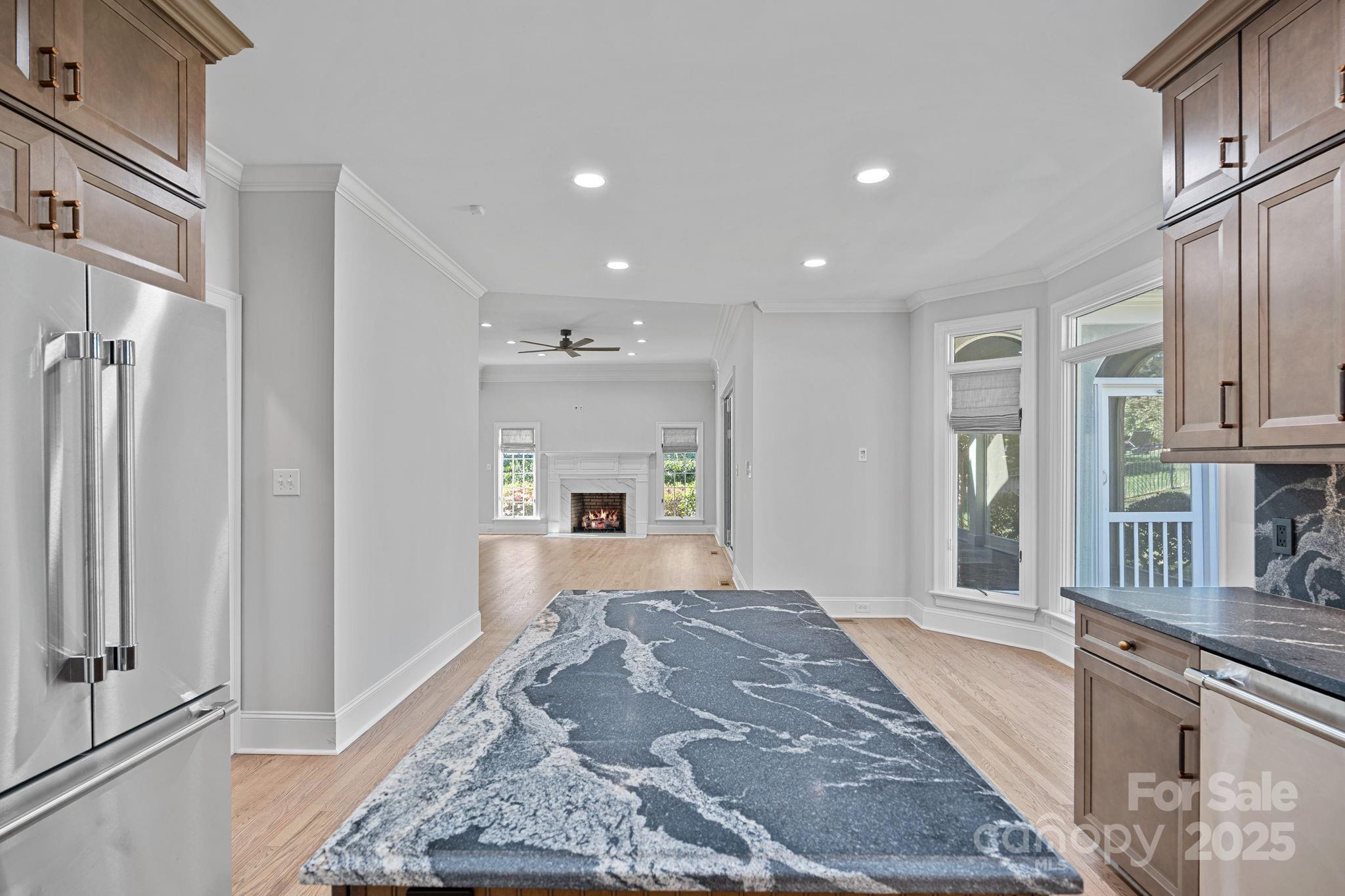 17608 River Ford Drive Davidson, NC 28036 - Photo 17 of 48 a spacious bathroom with a granite countertop sink a mirror and a shower