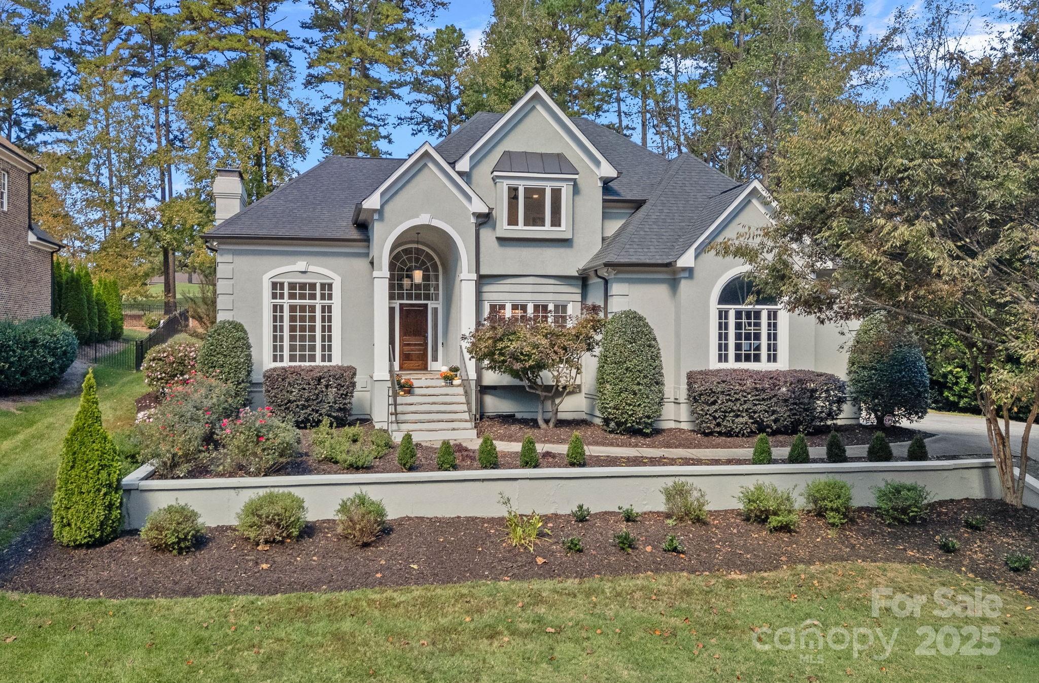 17608 River Ford Drive Davidson, NC 28036 - Photo 2 of 48 a front view of a house with a yard