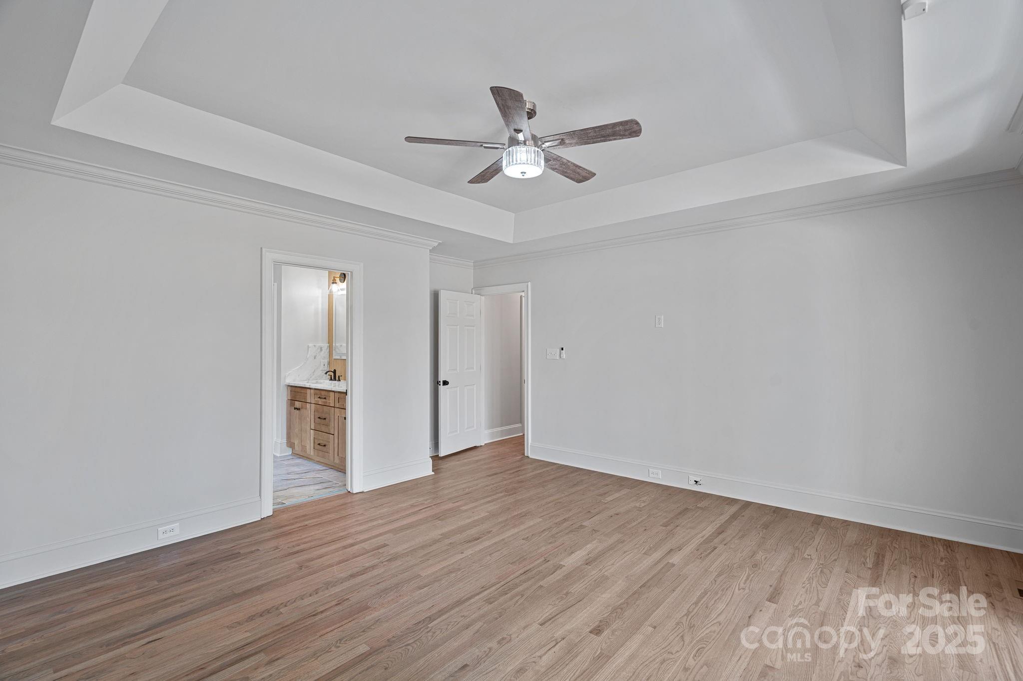 17608 River Ford Drive Davidson, NC 28036 - Photo 23 of 48 wooden floor in an empty room with a window