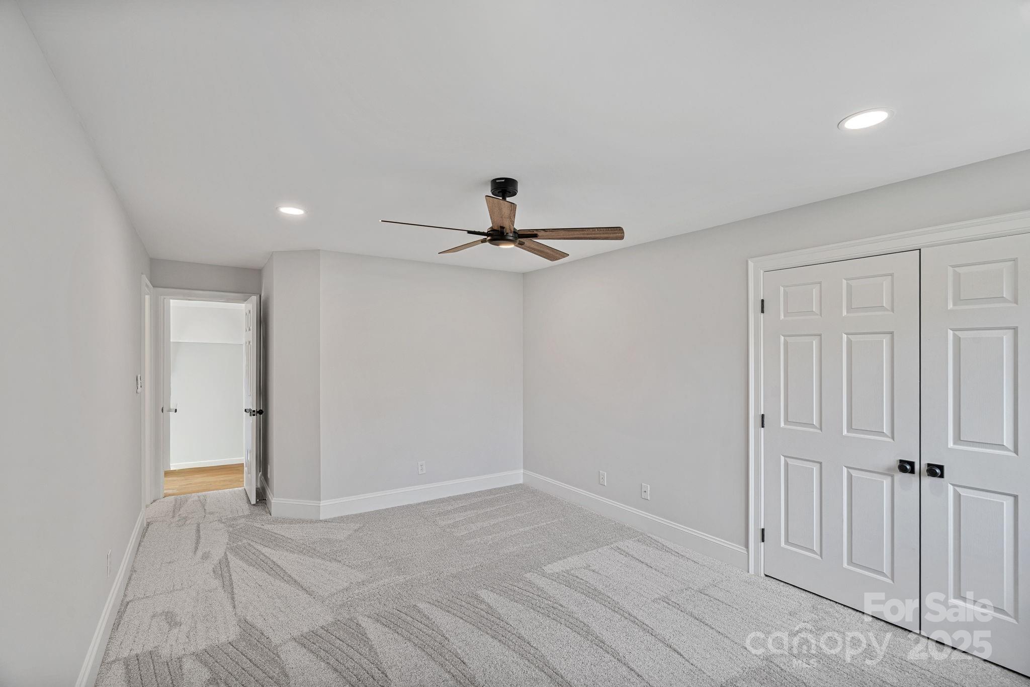 17608 River Ford Drive Davidson, NC 28036 - Photo 31 of 48 wooden floor in an empty room with a window