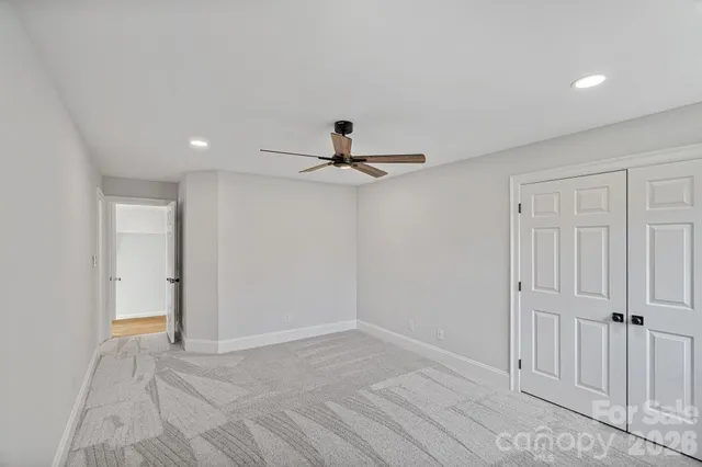 a bathroom with double vanity sink and a mirror