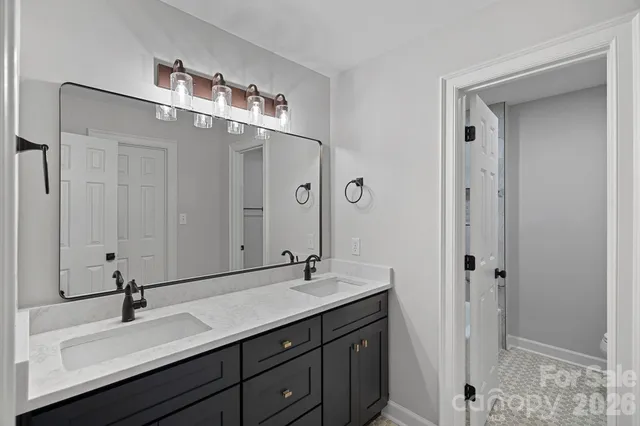 a bathroom with a shower curtain and a bath tub