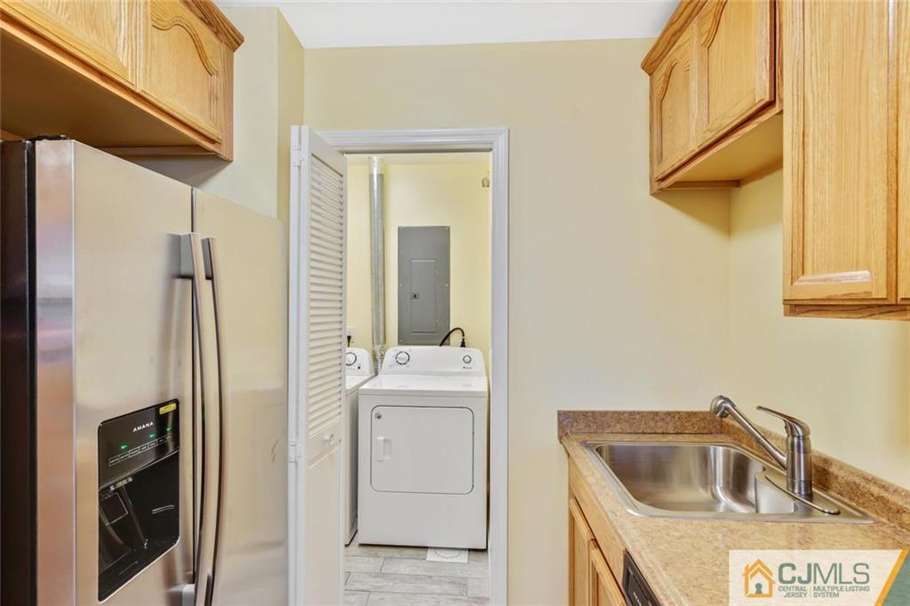 3 Valery Road Old Bridge, NJ 07747 - Photo 14 of 19 a kitchen with a sink and refrigerator