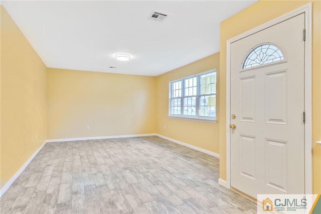 3 Valery Road Old Bridge, NJ 07747 - Photo 5 of 19 an empty room with windows