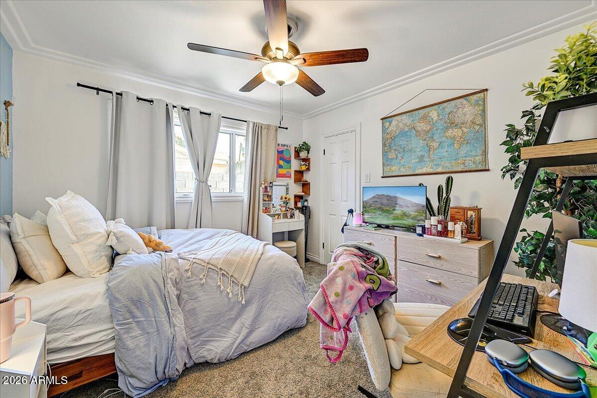 607 West 15th Street Tempe, AZ 85281 - Photo 22 of 29 a bed room with a bed and a window