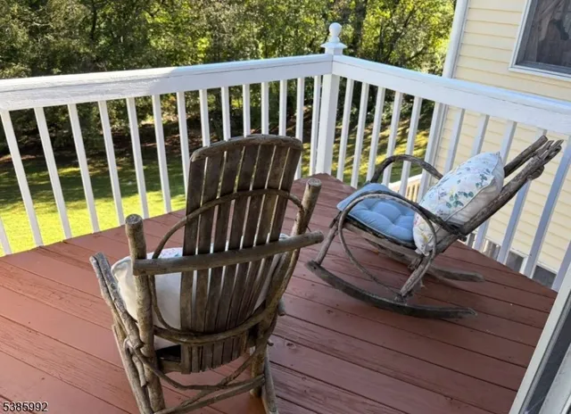 a view of a two chairs in the deck