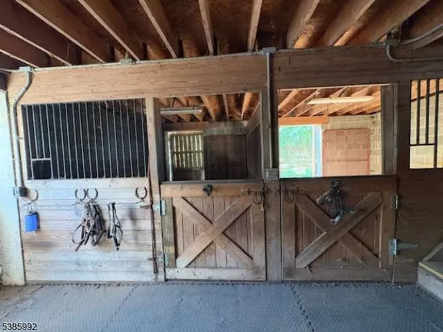 a view of a street with a building and trees