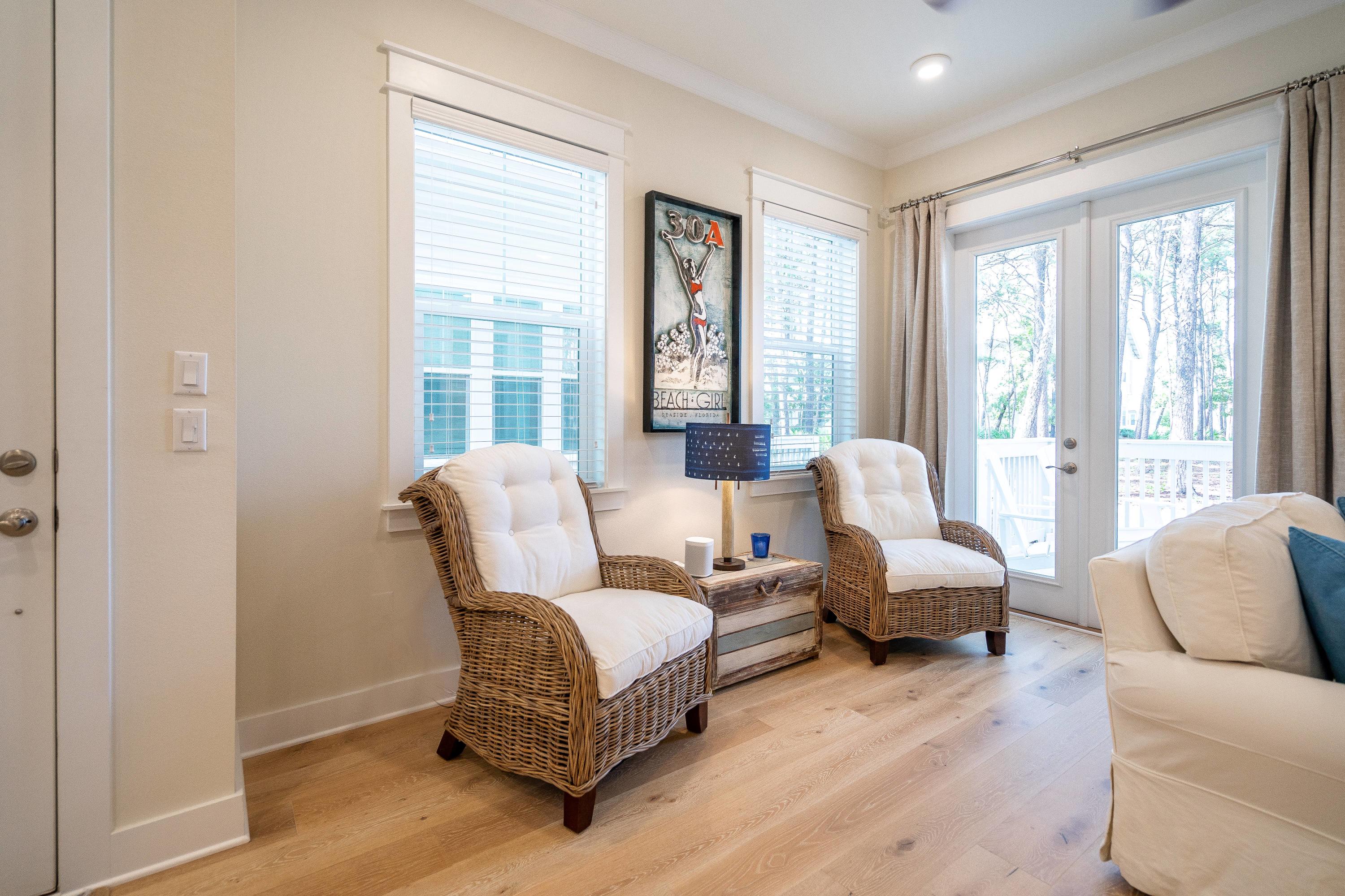 89 East Pine Lands Loop, Unit A Inlet Beach, FL 32461 - Photo 13 of 41 a living room with furniture and windows