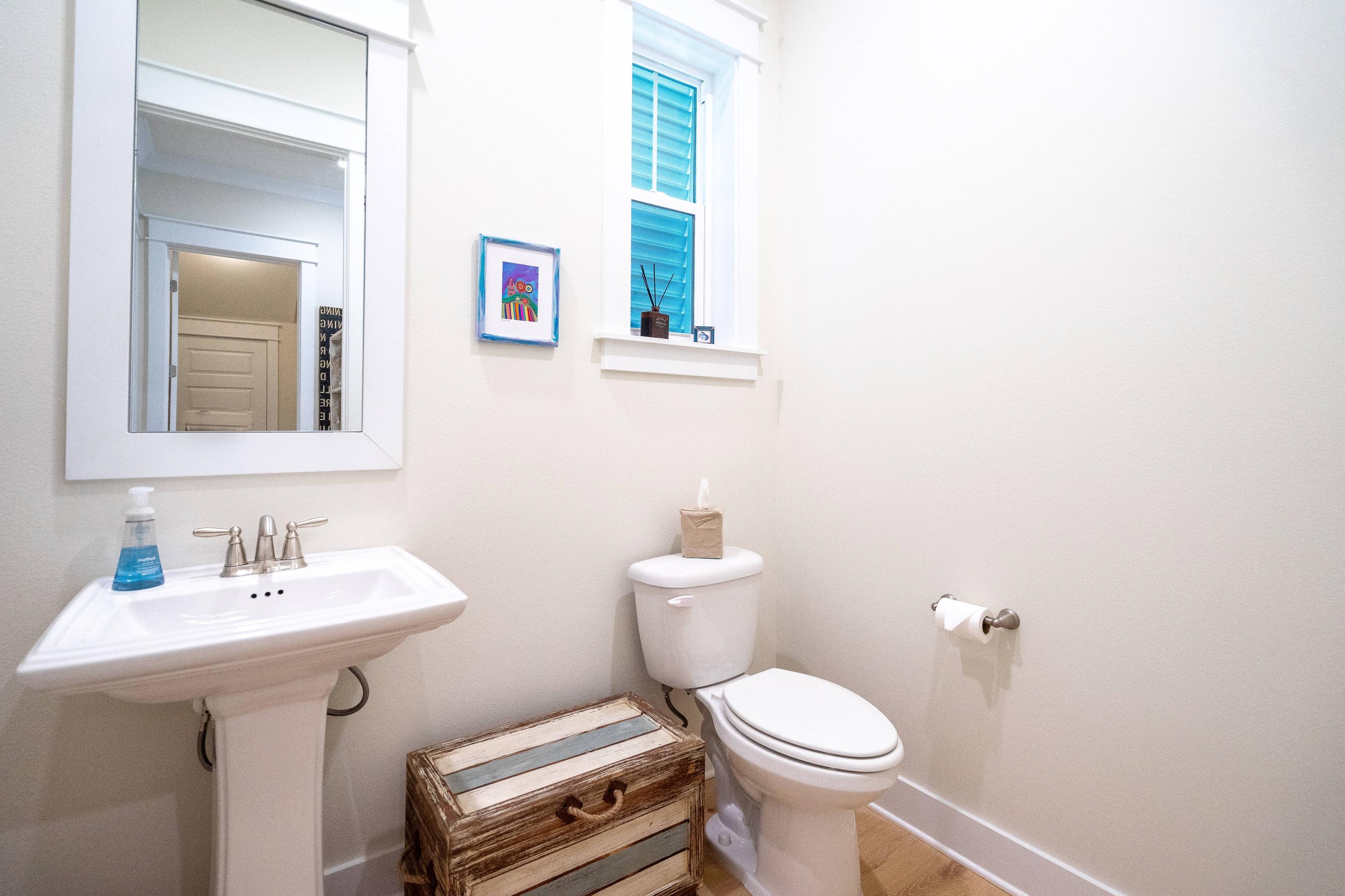 89 East Pine Lands Loop, Unit A Inlet Beach, FL 32461 - Photo 14 of 41 a bathroom with a sink toilet and a mirror