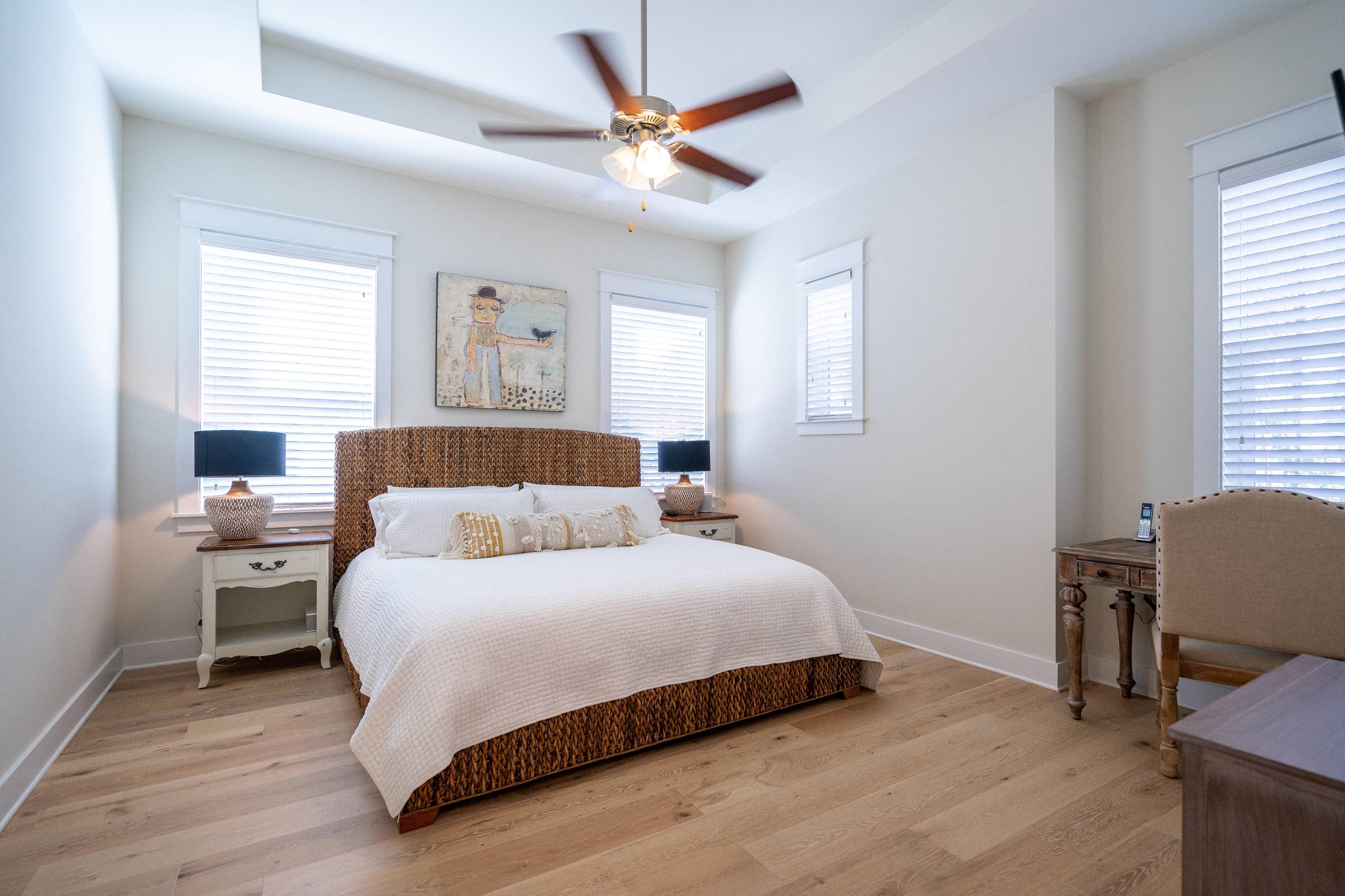 89 East Pine Lands Loop, Unit A Inlet Beach, FL 32461 - Photo 16 of 41 a bedroom with a bed and a desk