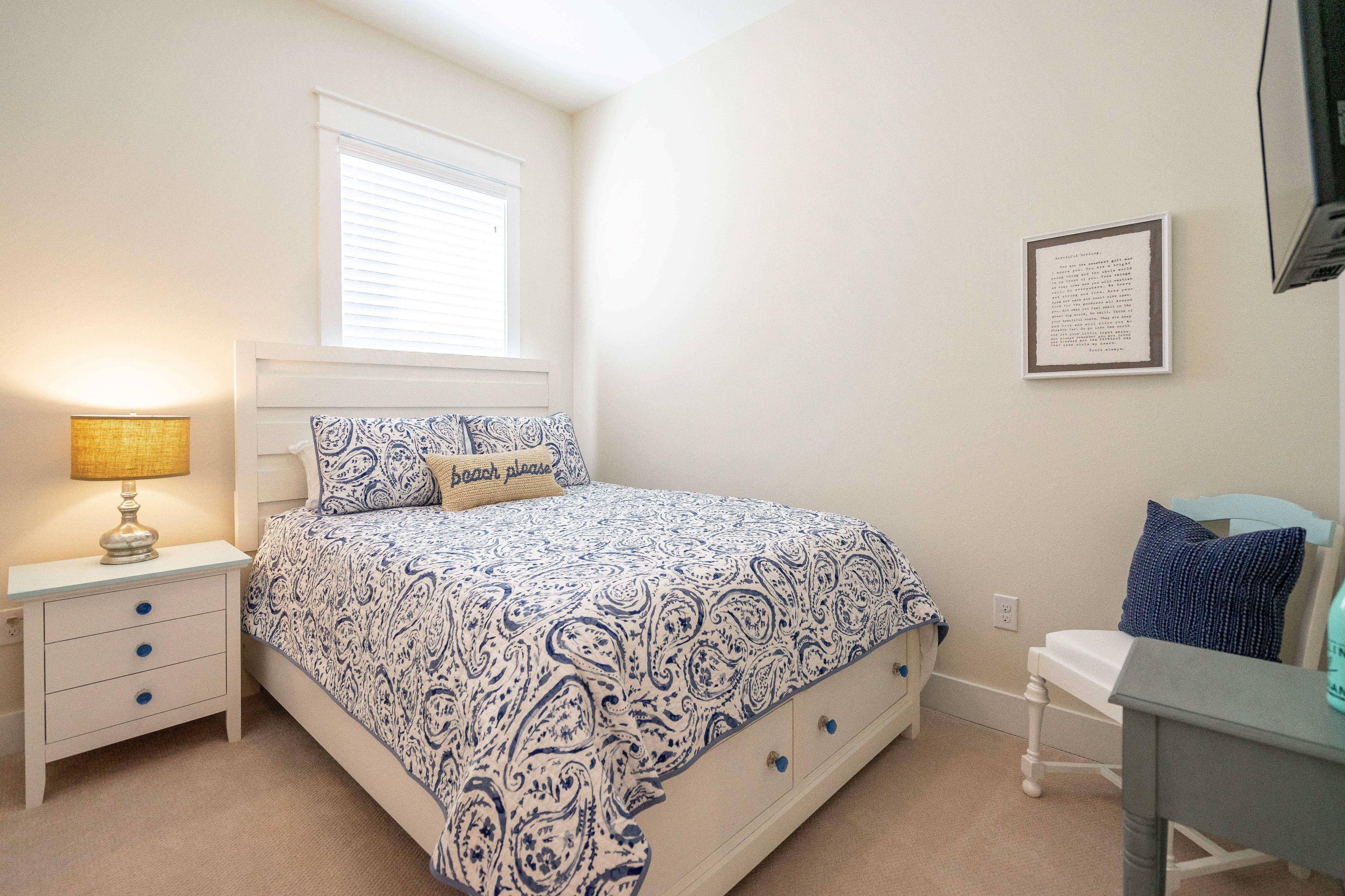 89 East Pine Lands Loop, Unit A Inlet Beach, FL 32461 - Photo 19 of 41 a bedroom with a bed and a window