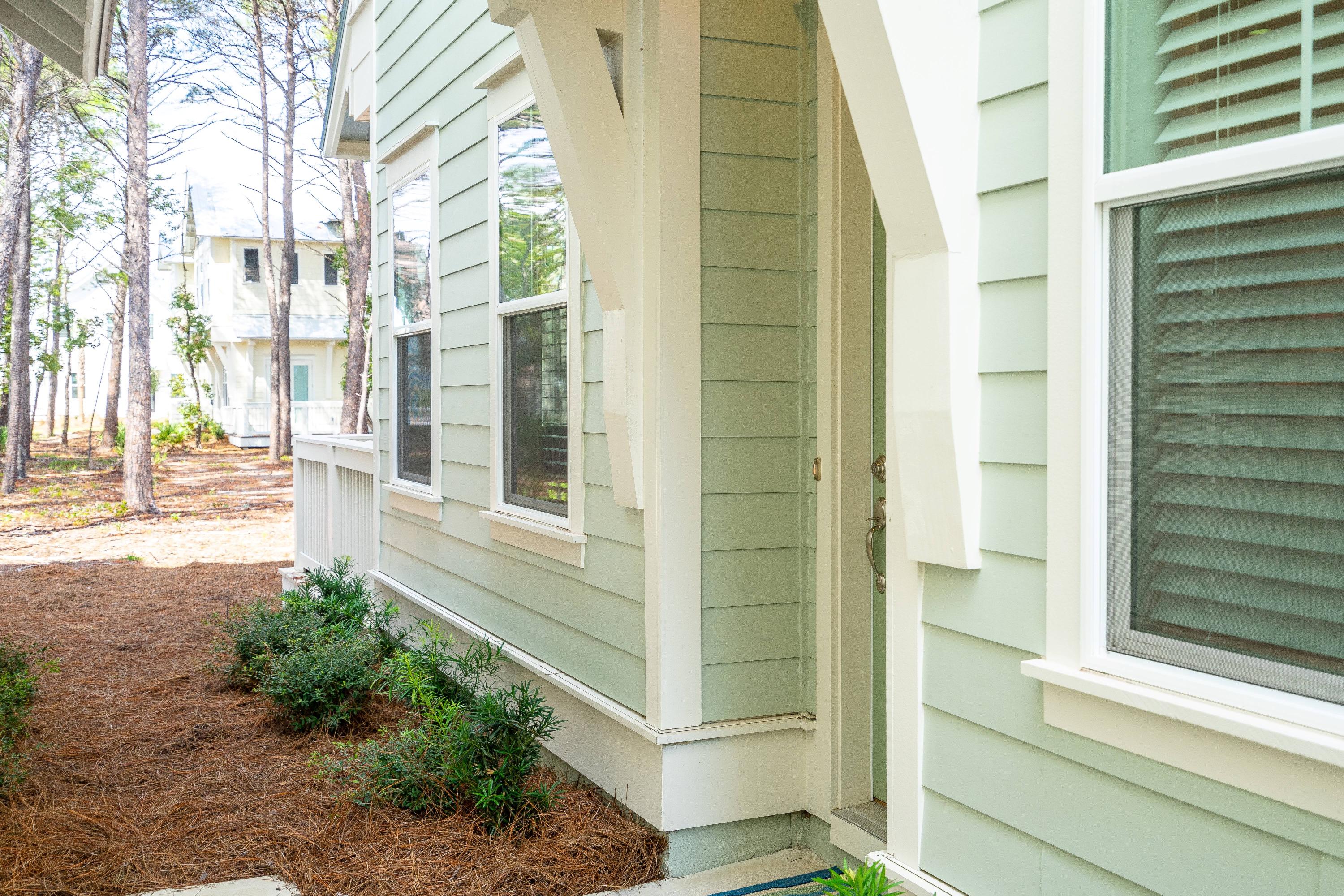 89 East Pine Lands Loop, Unit A Inlet Beach, FL 32461 - Photo 24 of 41 a view of a door of the house
